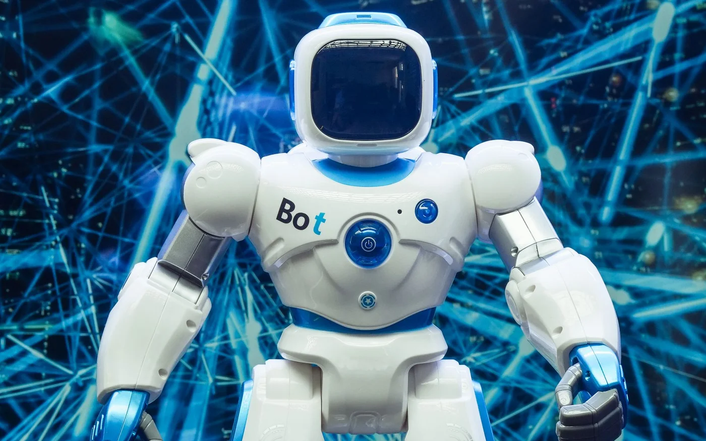 Robot against a blue network background, illustrating AI-assisted discovery