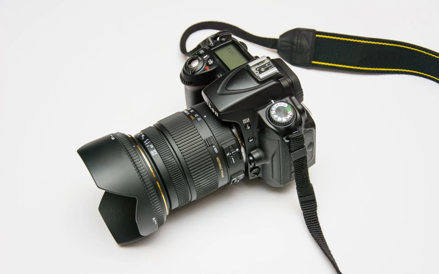 Close view of a camera lens, illustrating the editorial image workflow